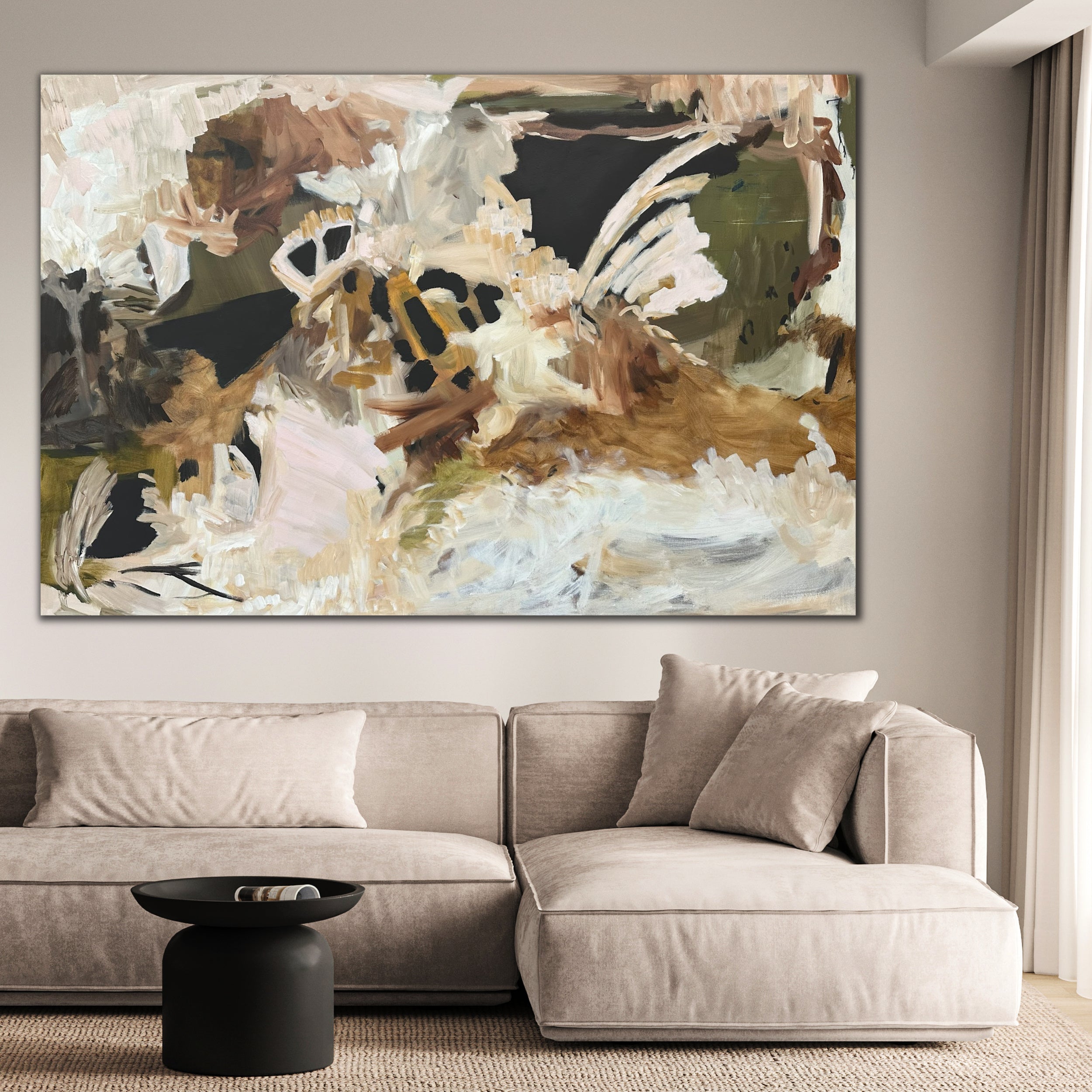 Abstract painting 'Her Kind Nature' by Kylie Sams hanging on a wall above a beige sofa in a living room.