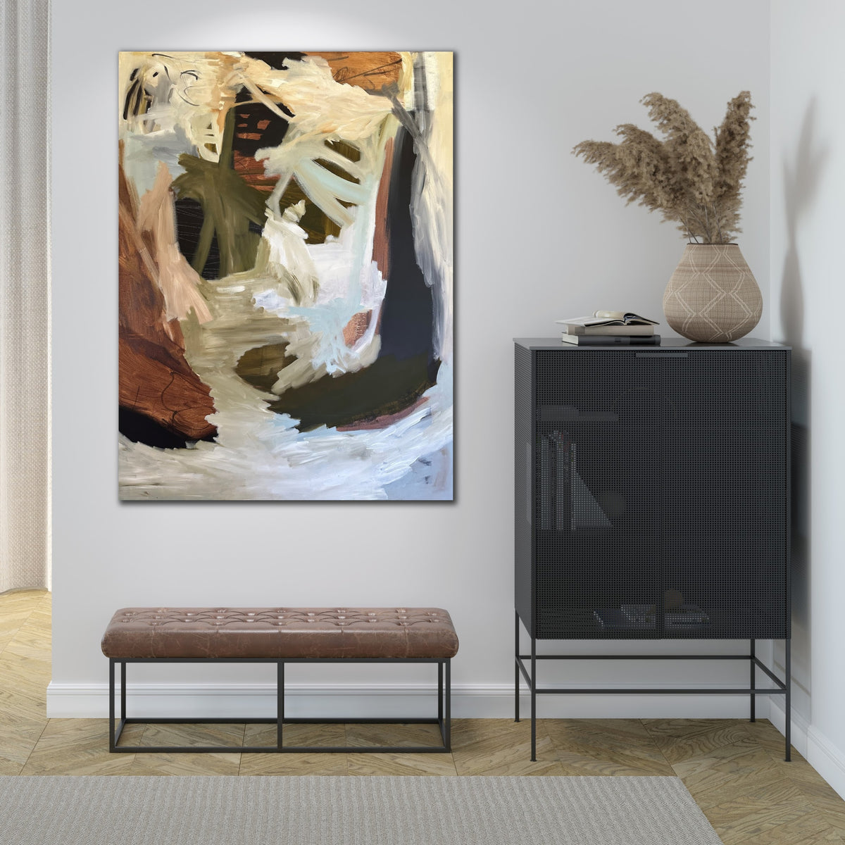 Abstract painting in soft blue and earthy colours hanging on wall in contemporary interior.