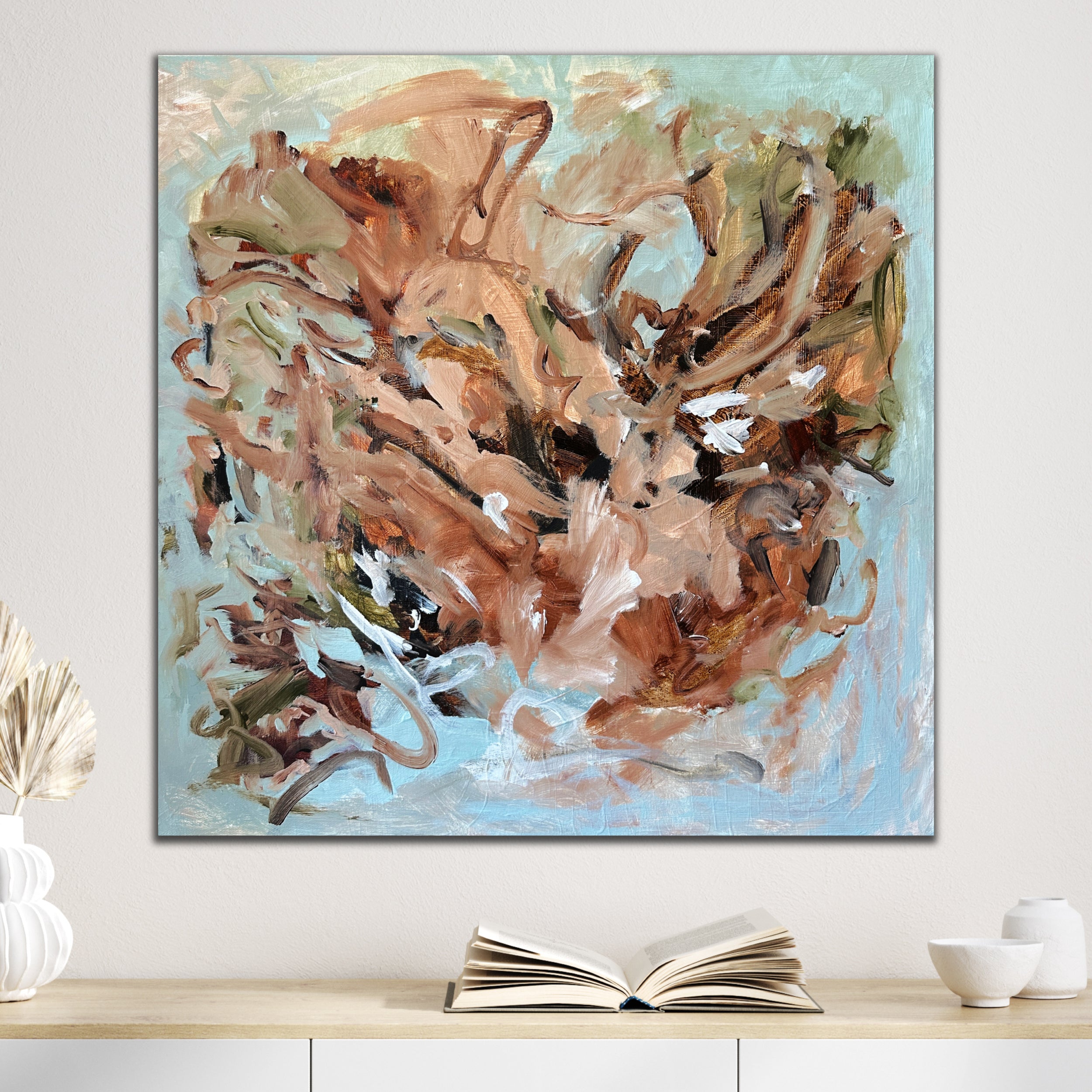 Expressive, abstract floral painting "Flourish" hanging on wall in modern home with neutral furnishings