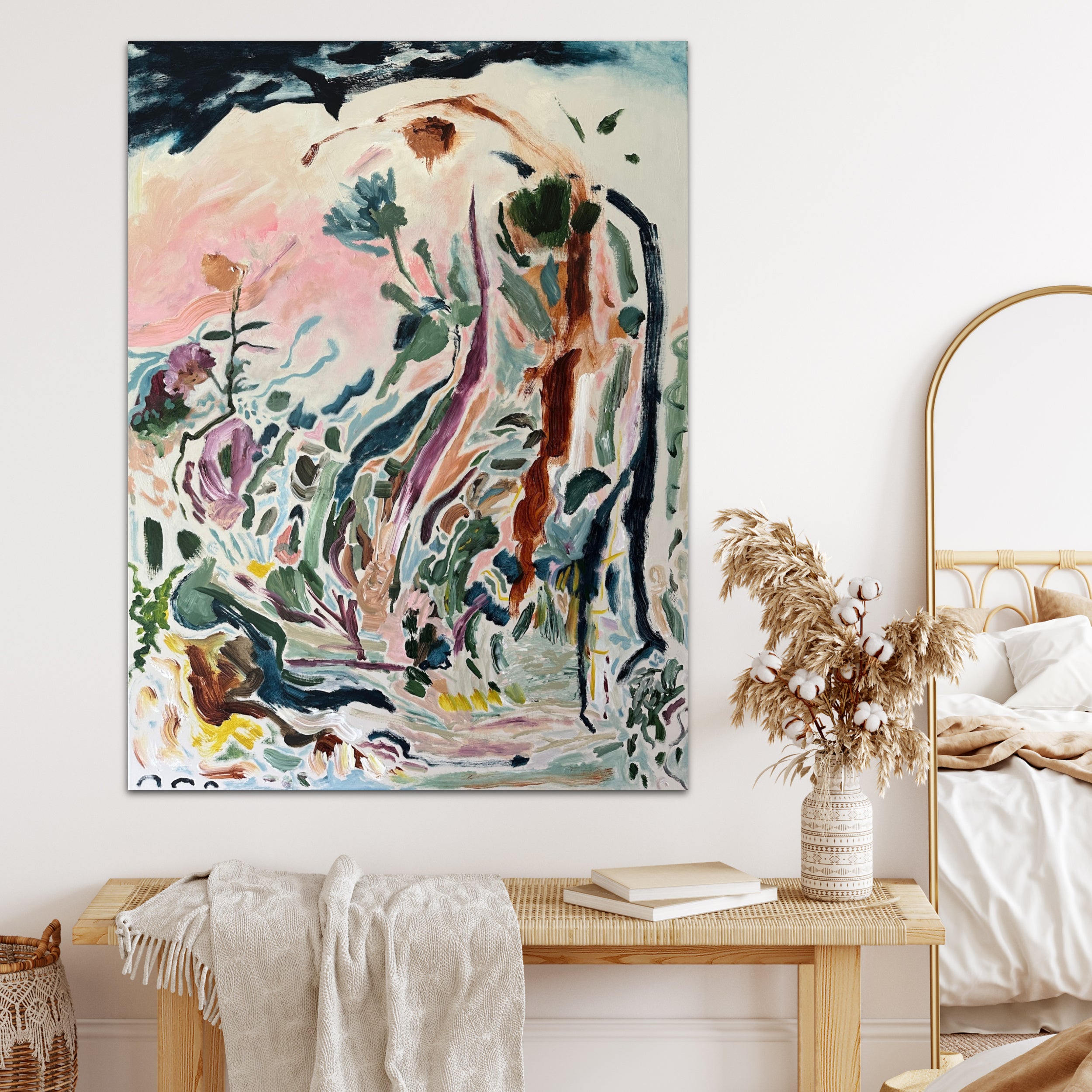 Soothing abstract botanical landscape painting hanging on wall in modern neutral bedroom with natural furnishings