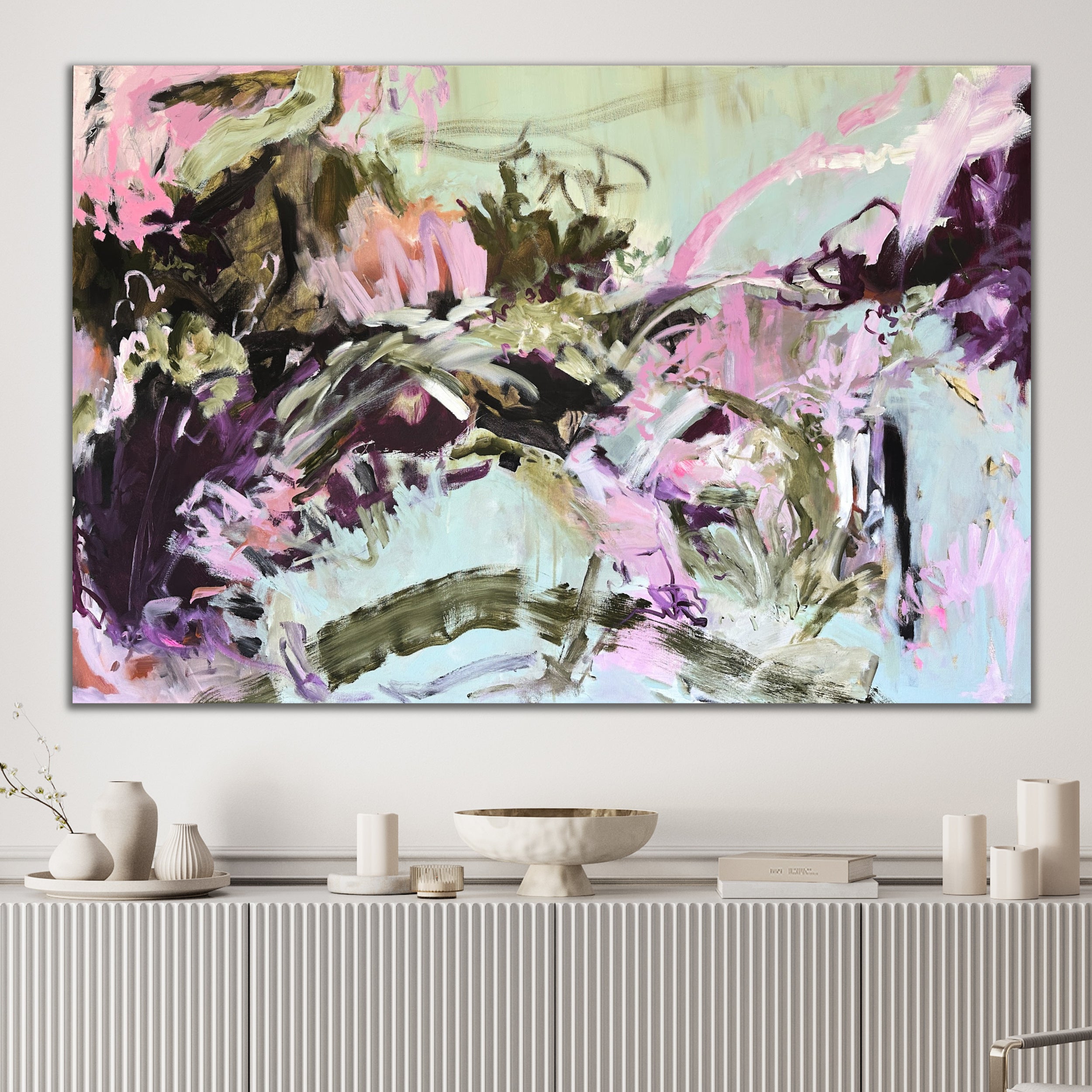 Large expressive abstract painting "Mad Love" in soft blue, pink, aubergine and olive green hanging on wall in stylish modern home interior