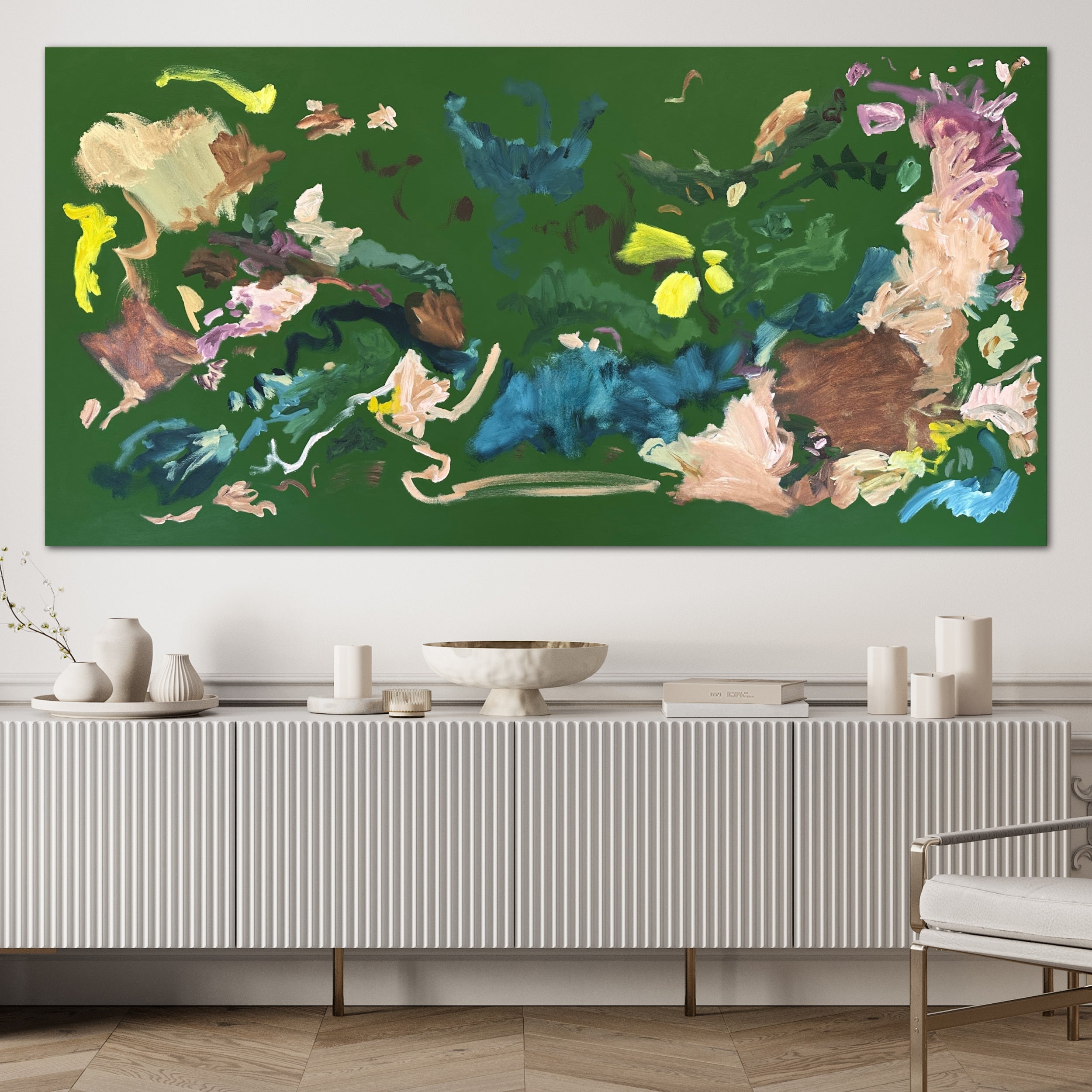 Large abstract botanical painting in dark green and bright colours hanging in contemporary home interior