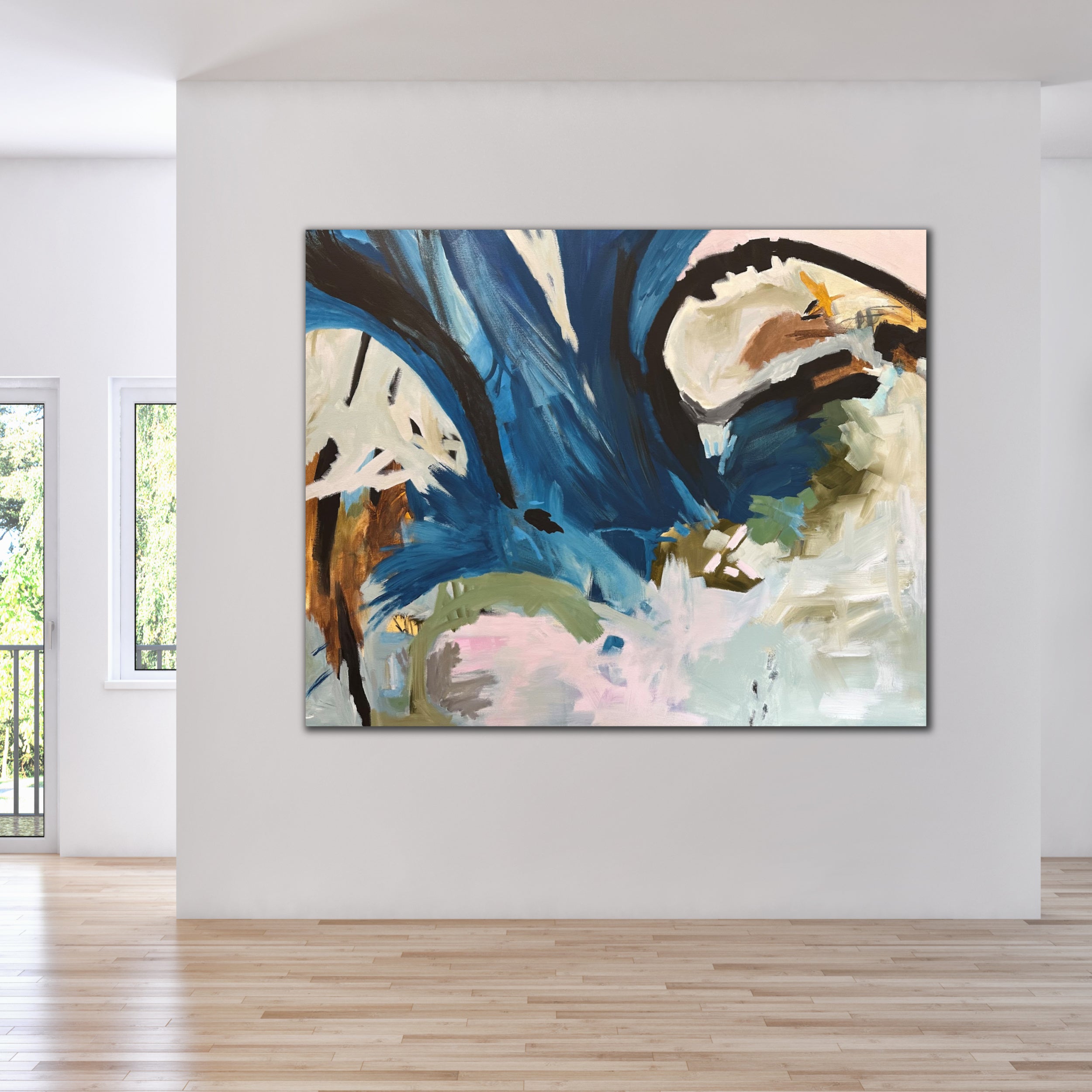 Large blue abstract painting on canvas with a bold, energetic composition hanging on wall in neutral, modern home interior