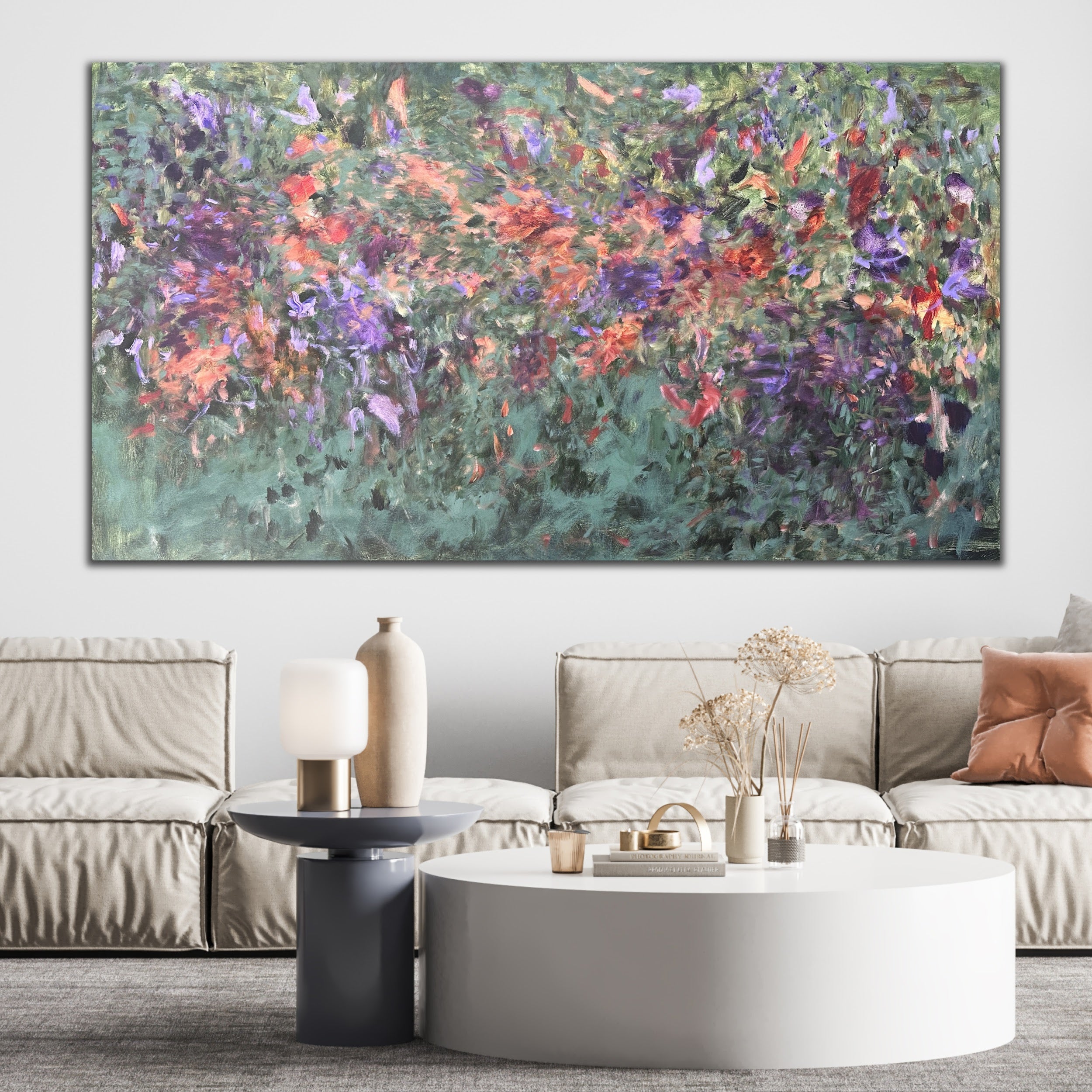Large green abstract painting with purple, rust red and brown gestures hanging on wall in modern living room