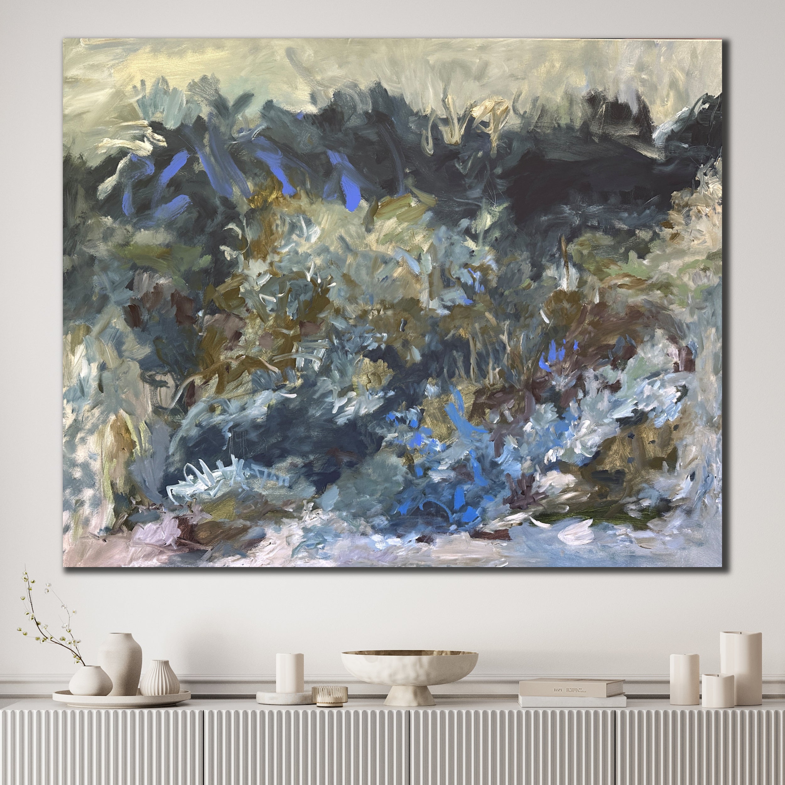Large abstract painting alluding to nature, hanging on wall in modern home interior
