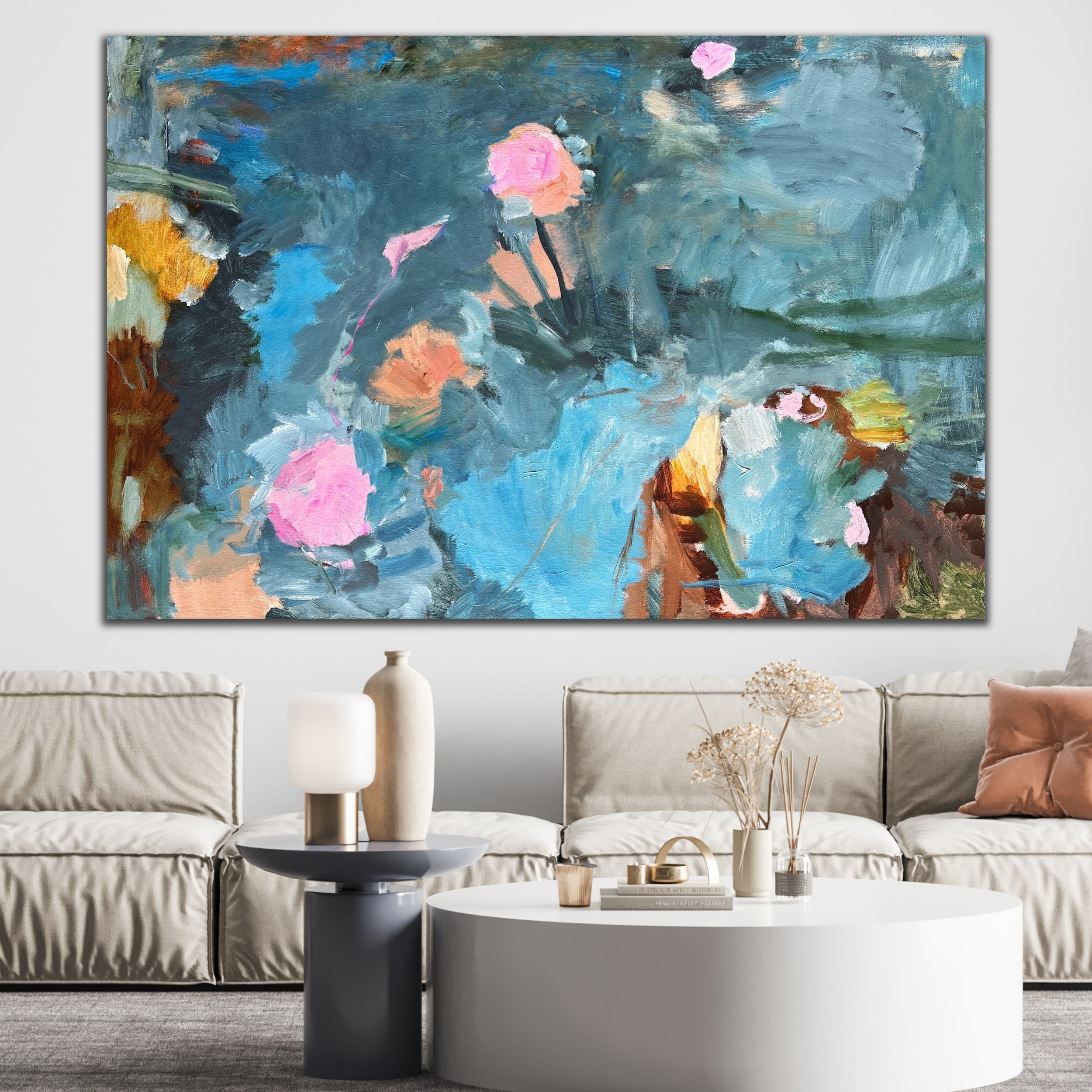 Abstract expressionist painting inspired by nature and flora, hanging above lounge in contemporary living room