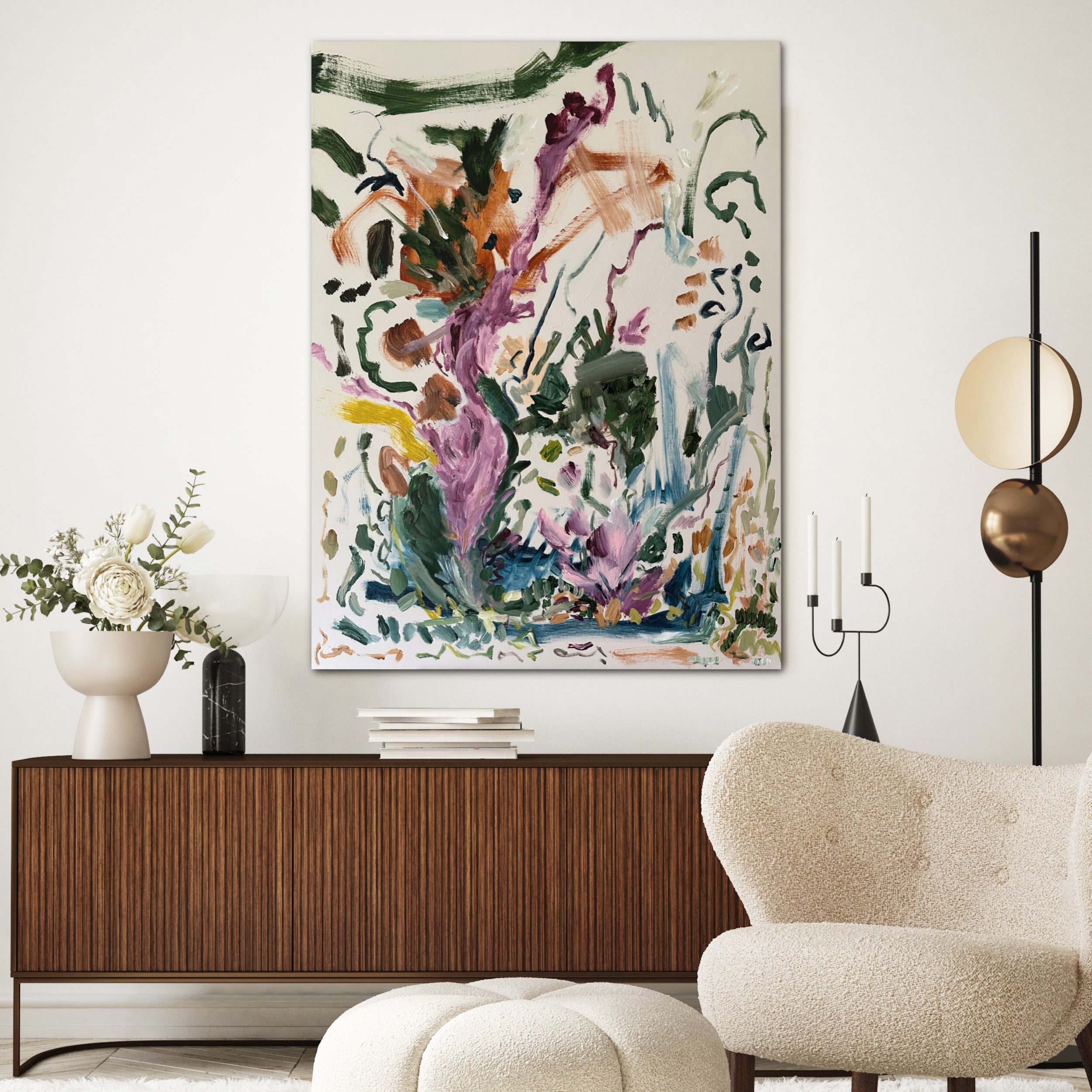 Wild abstract expressionist painting alluding to plants and flowers hanging in modern living room