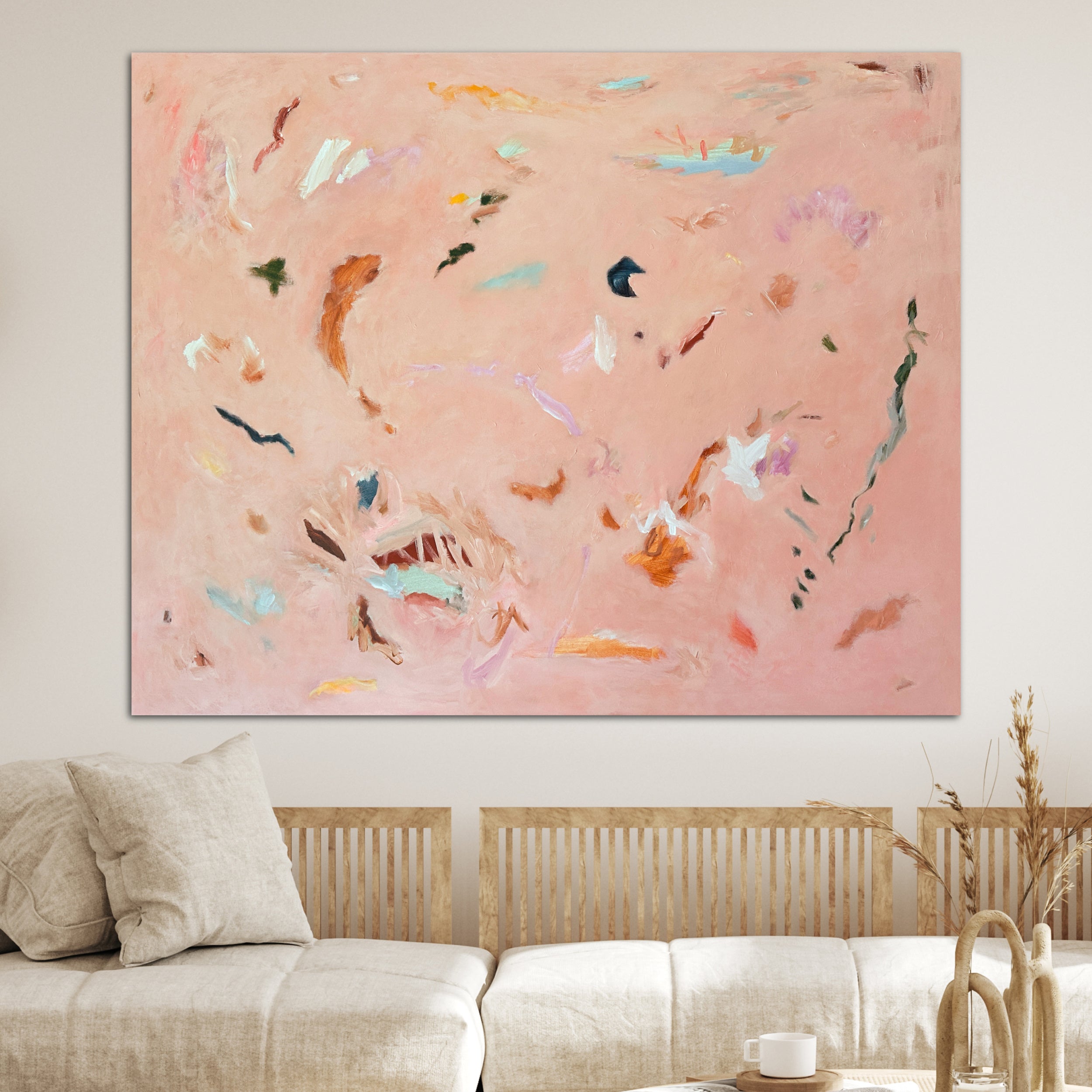 Soothing abstract wall art hanging on wall in modern home with natural, earthy furnishings