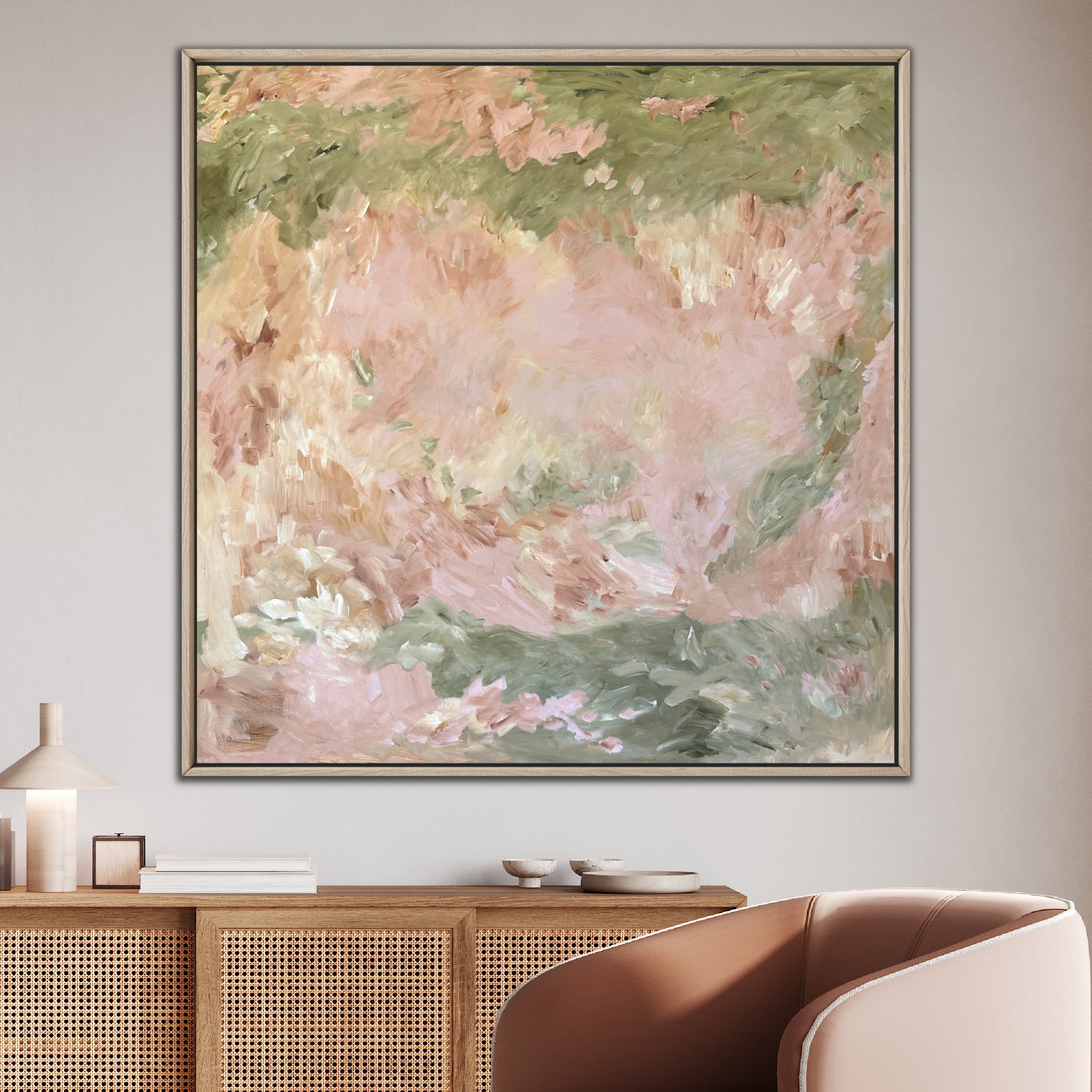 Square abstract painting in oak frame hanging in modern living room
