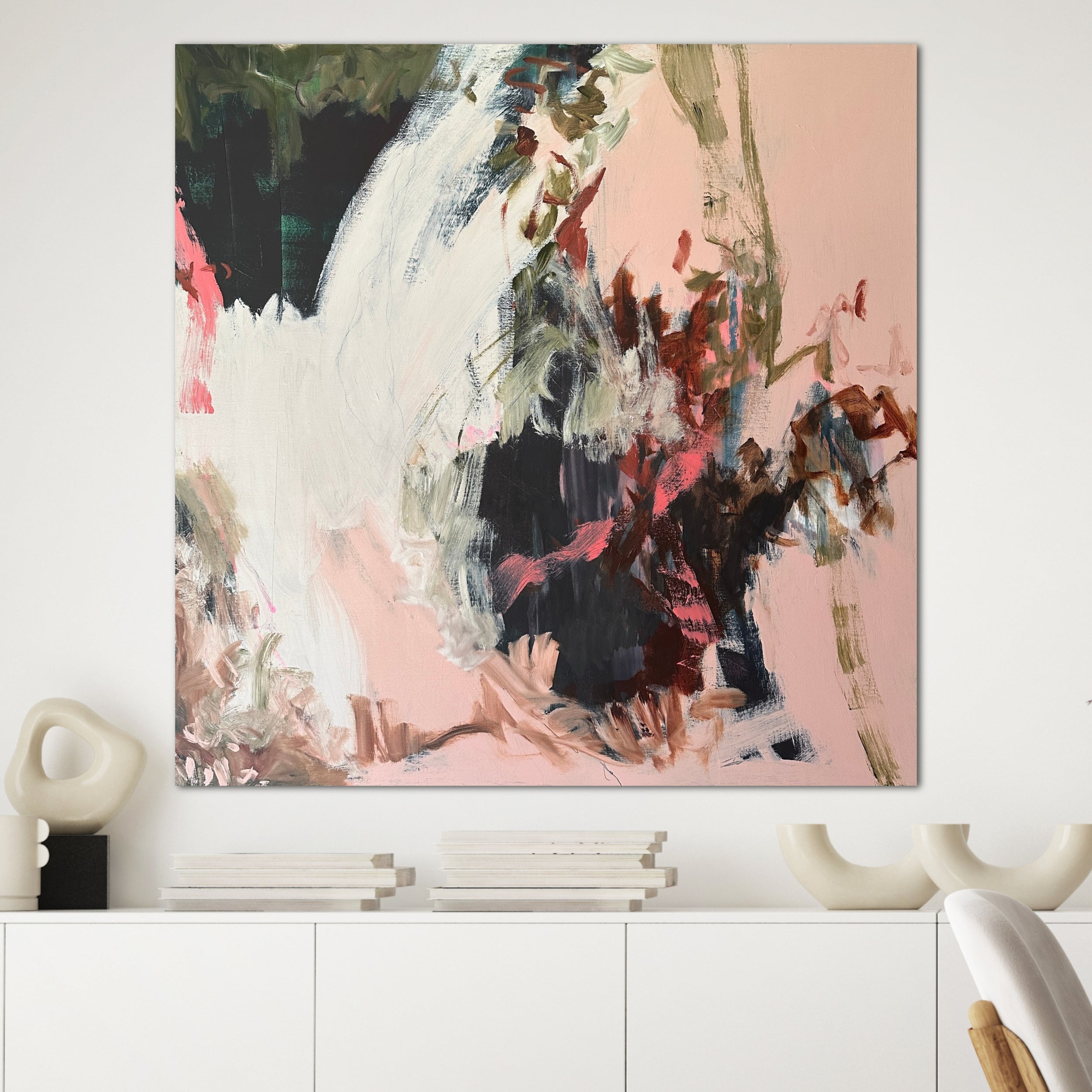 Modern abstract artwork hanging on wall in modern home