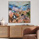 Abstract painting of a field in nature on a wall in a modern room