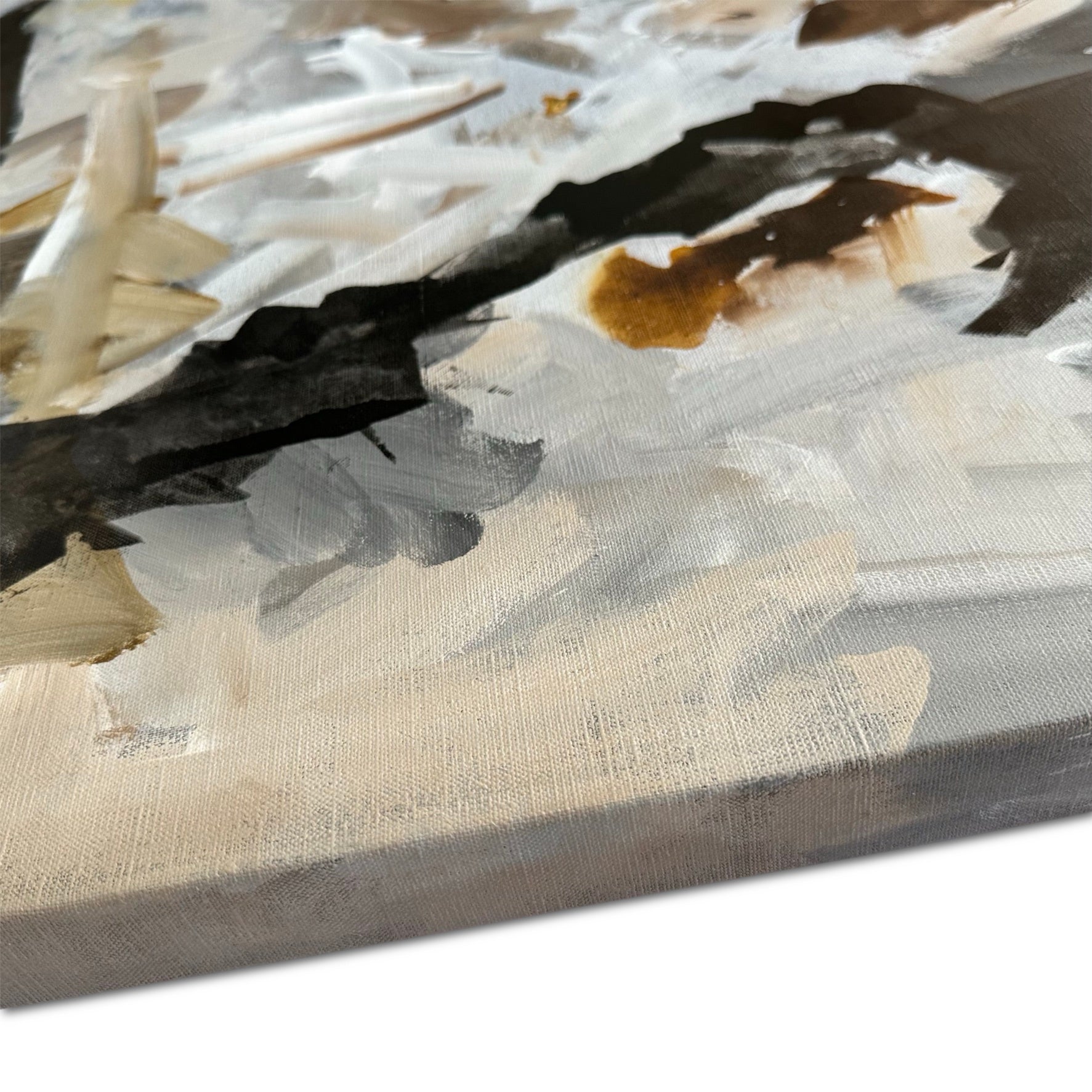Neutral abstract painting on canvas in black and natural tones - close-up detail of finished, painted edge of artwork