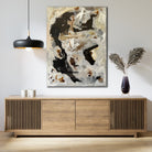 Modern abstract painting in black and neutral colours hanging on wall in contemporary interior with luxury decor
