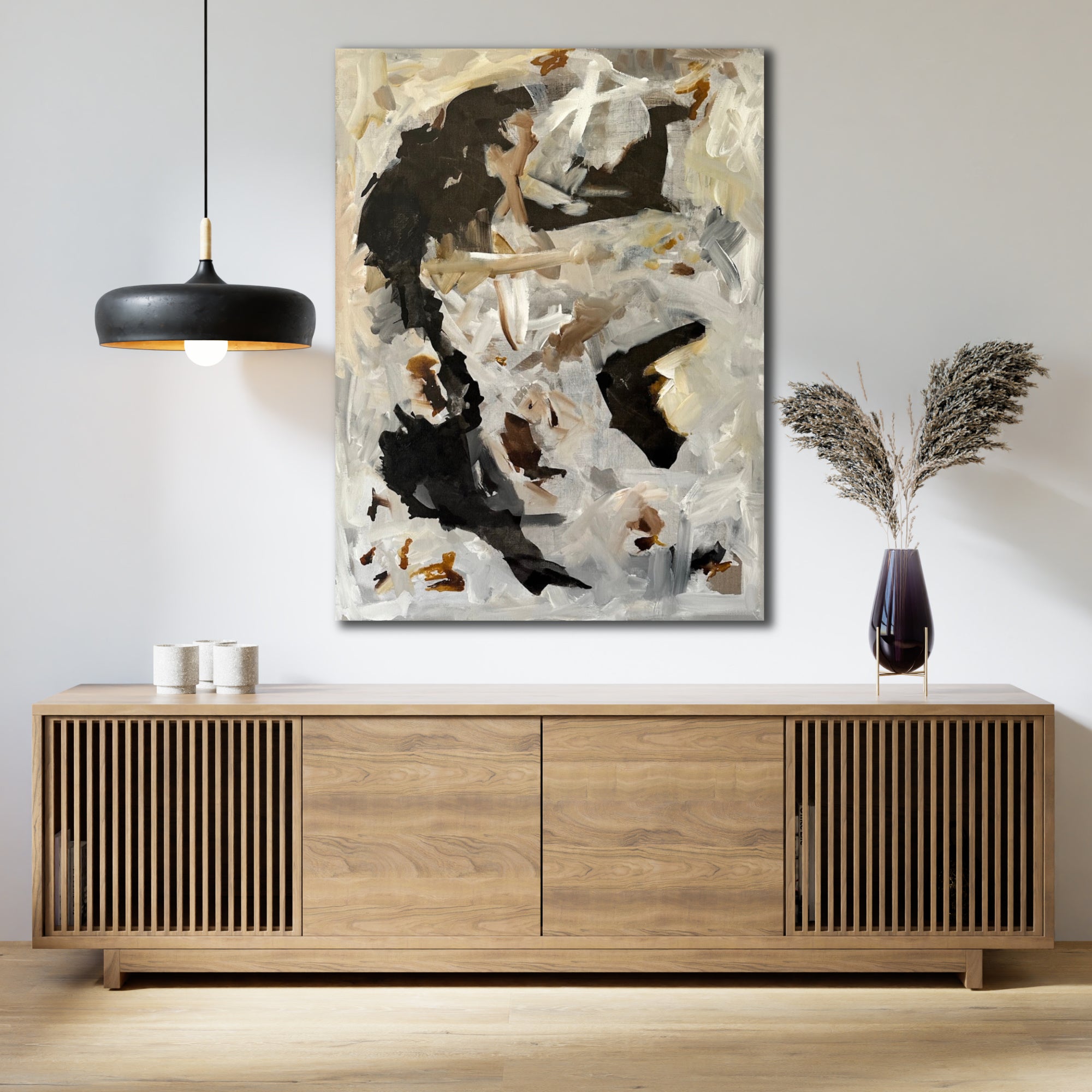 Modern abstract painting in black and neutral colours hanging on wall in contemporary interior with luxury decor