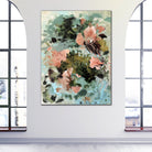 Contemporary floral painting hanging on a wall with large windows 