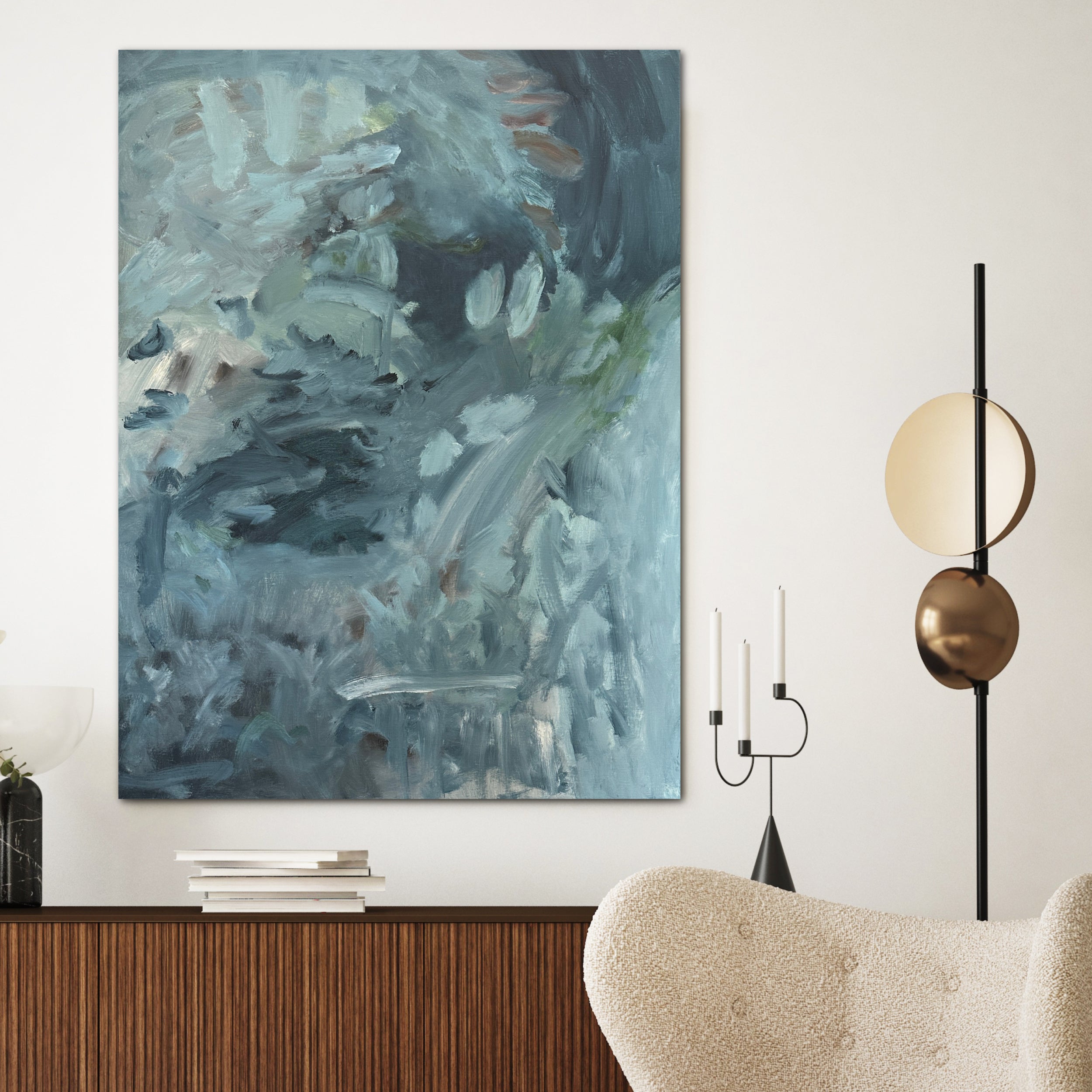 Modern blue abstract artwork hanging on wall in modern style living room