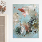 Contemporary artwork hanging on wall in modern interior with natural furnishings