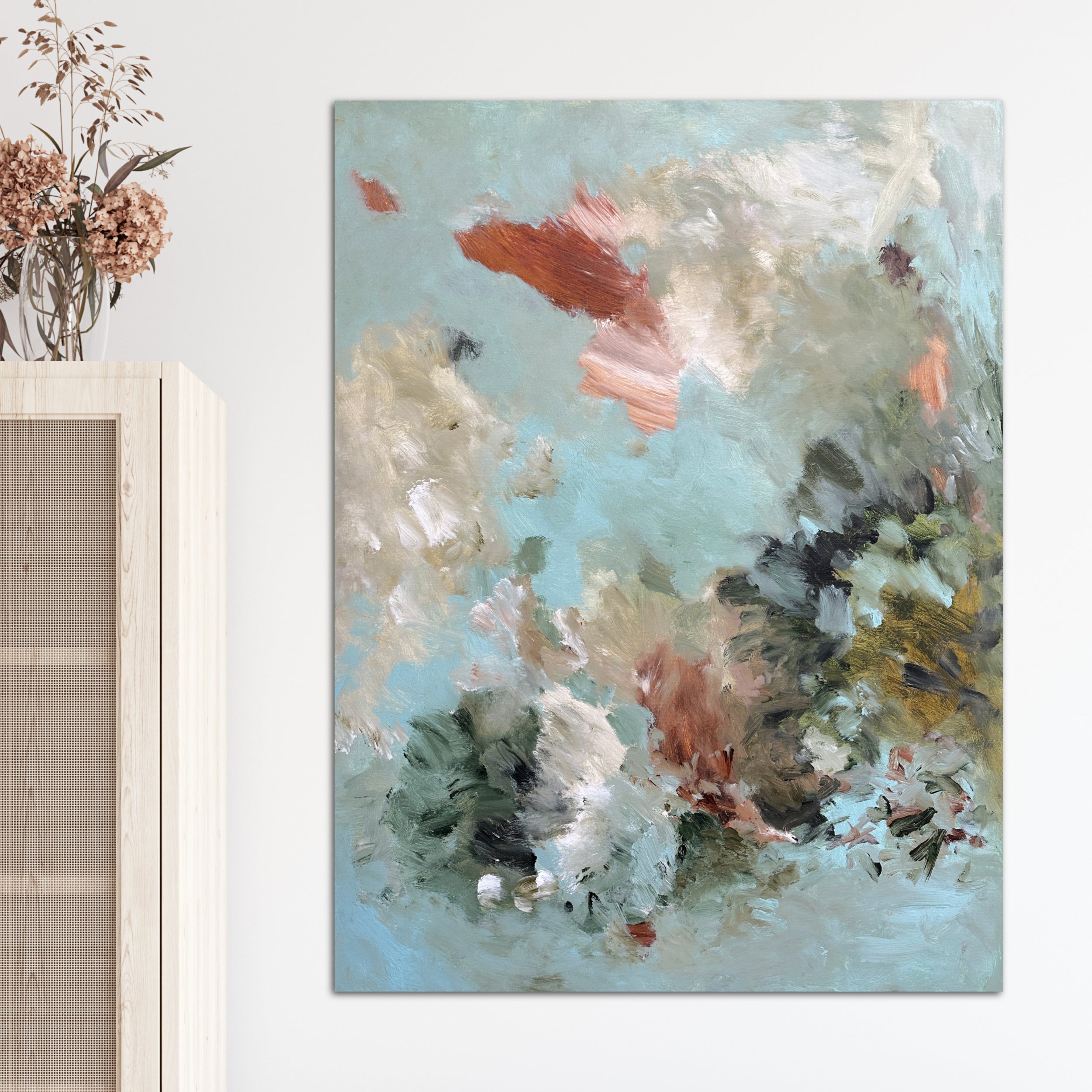 Contemporary artwork hanging on wall in modern interior with natural furnishings