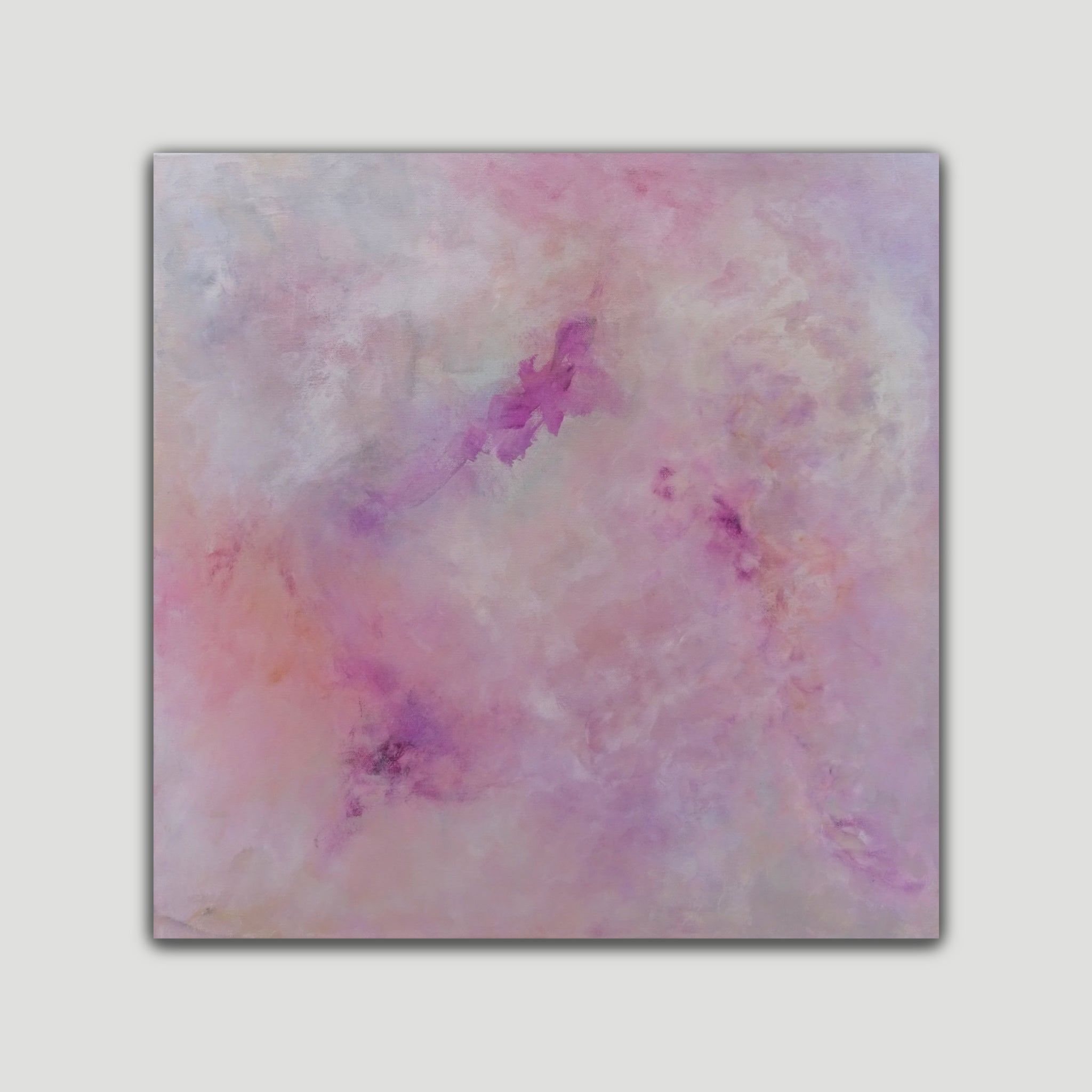 Calming abstract painting in shades of pink and white that alludes to clouds or the sky - front view