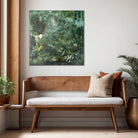Nature inspired contemporary artwork hanging on wall in modern home with furnishing in natural tones