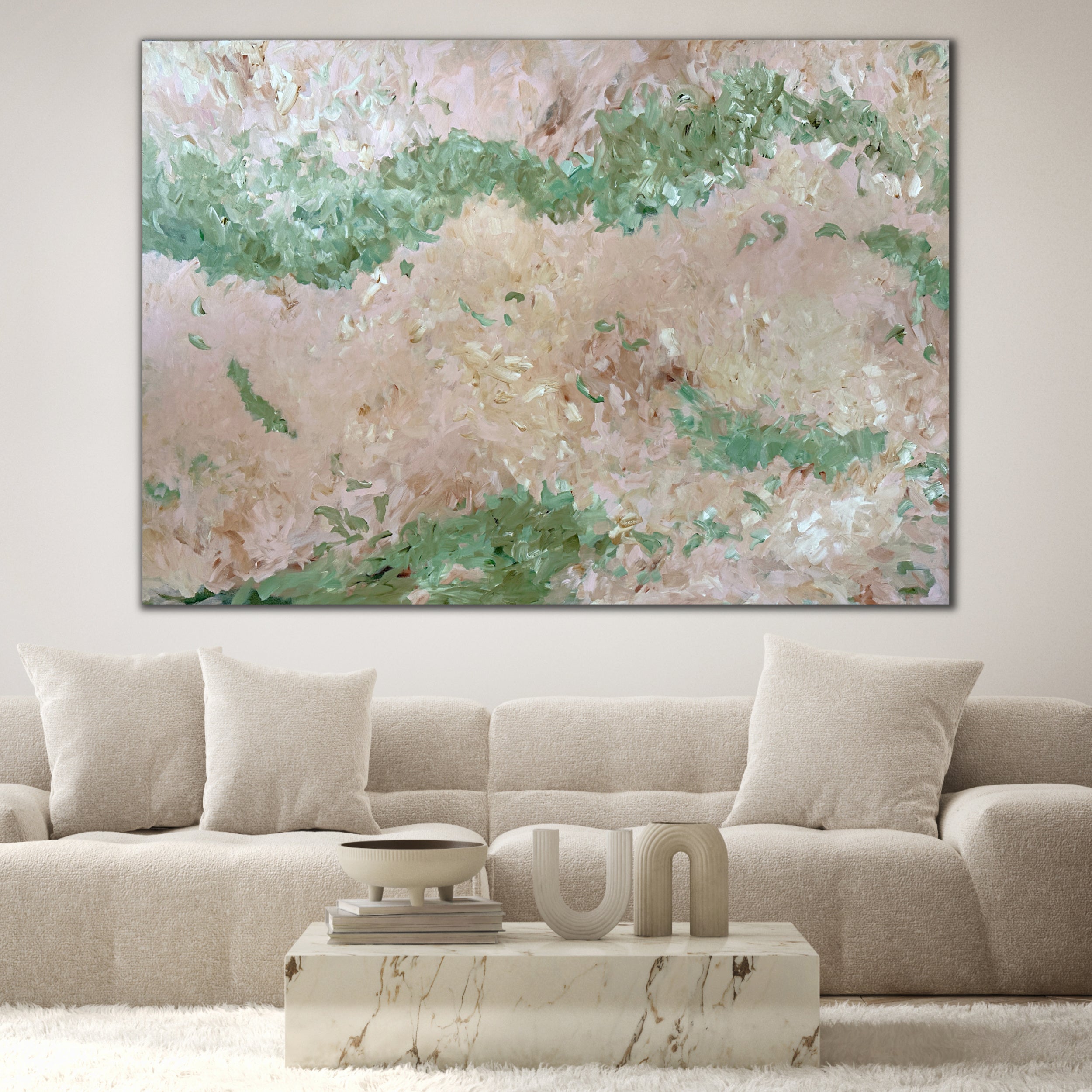 Expressive, large abstract painting in pink and green hanging in contemporary living room