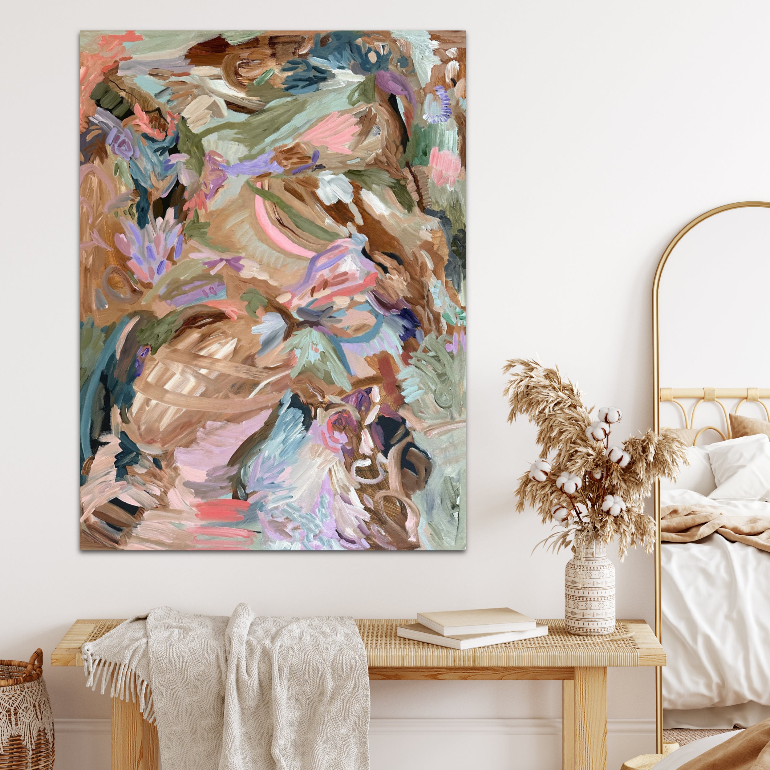 Abstract painting inspired by Spring and nature, hanging on wall in natural, boho style bedroom
