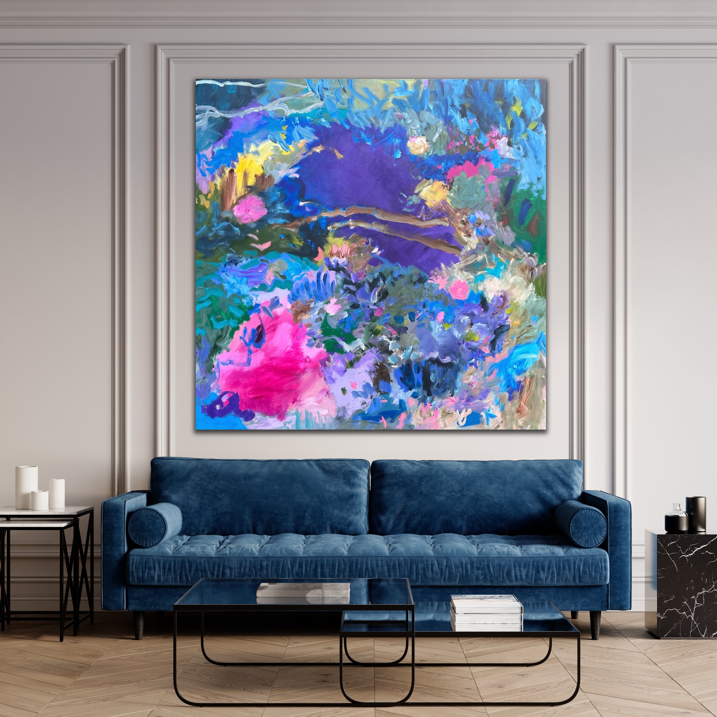 Vibrant, large abstract painting hanging on wall in modern living room above sofa. 