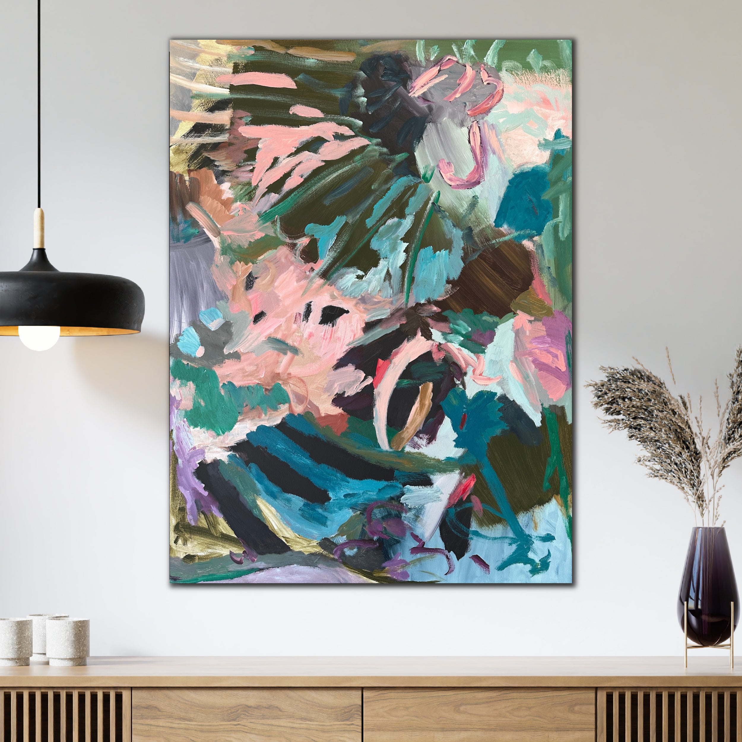 Contemporary abstract painting inspired by the jungle and nature displaying high energy and an expressive painting style hanging on wall in modern home interior