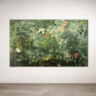 Large painting of a garden scene with greenery and hints of flowers on a white wall.
