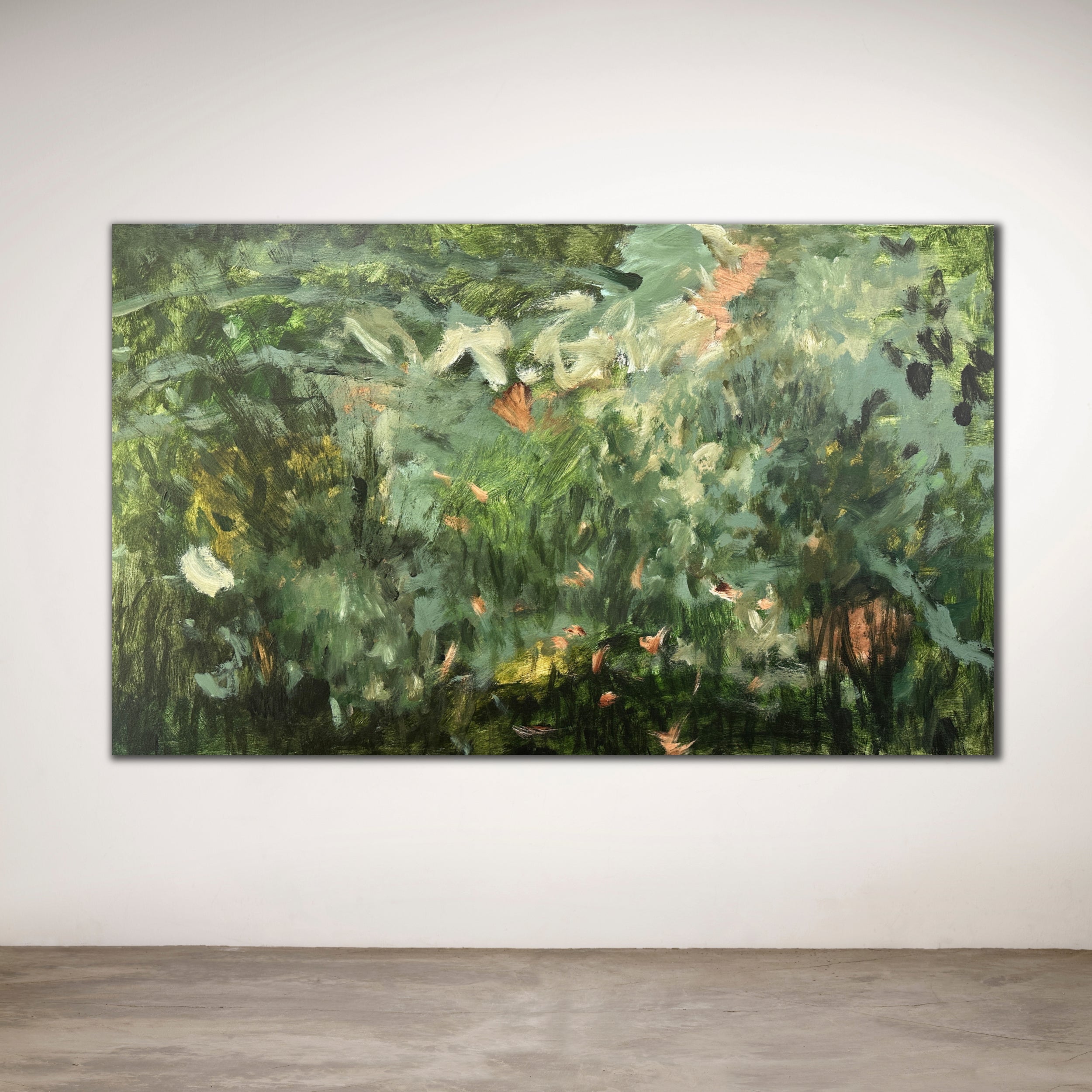Large painting of a garden scene with greenery and hints of flowers on a white wall.
