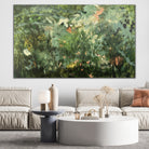 Large painting with green and natural tones hanging on wall in modern neutral living room