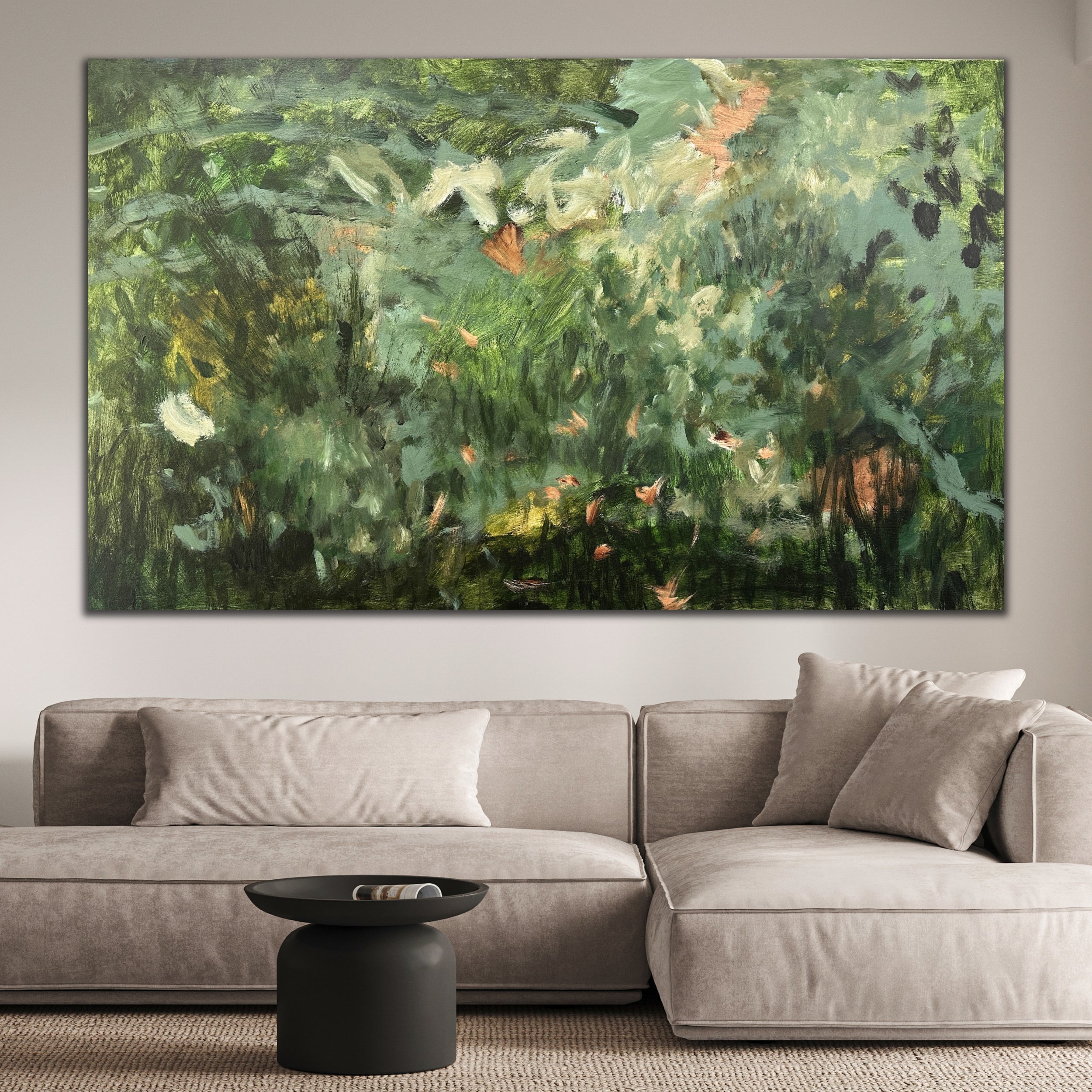 Large green abstract painting inspired by nature hanging on wall over sofa in modern living room
