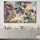 Modern abstract painting inspired by nature hanging in minimalist modern home interior
