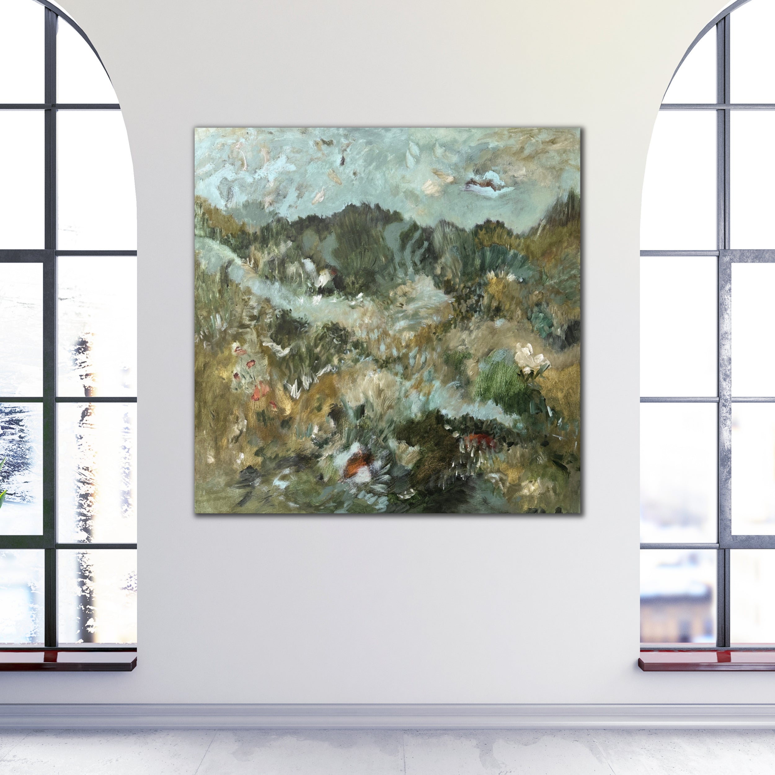 Abstract painting of a countryside landscape hanging on wall in white room