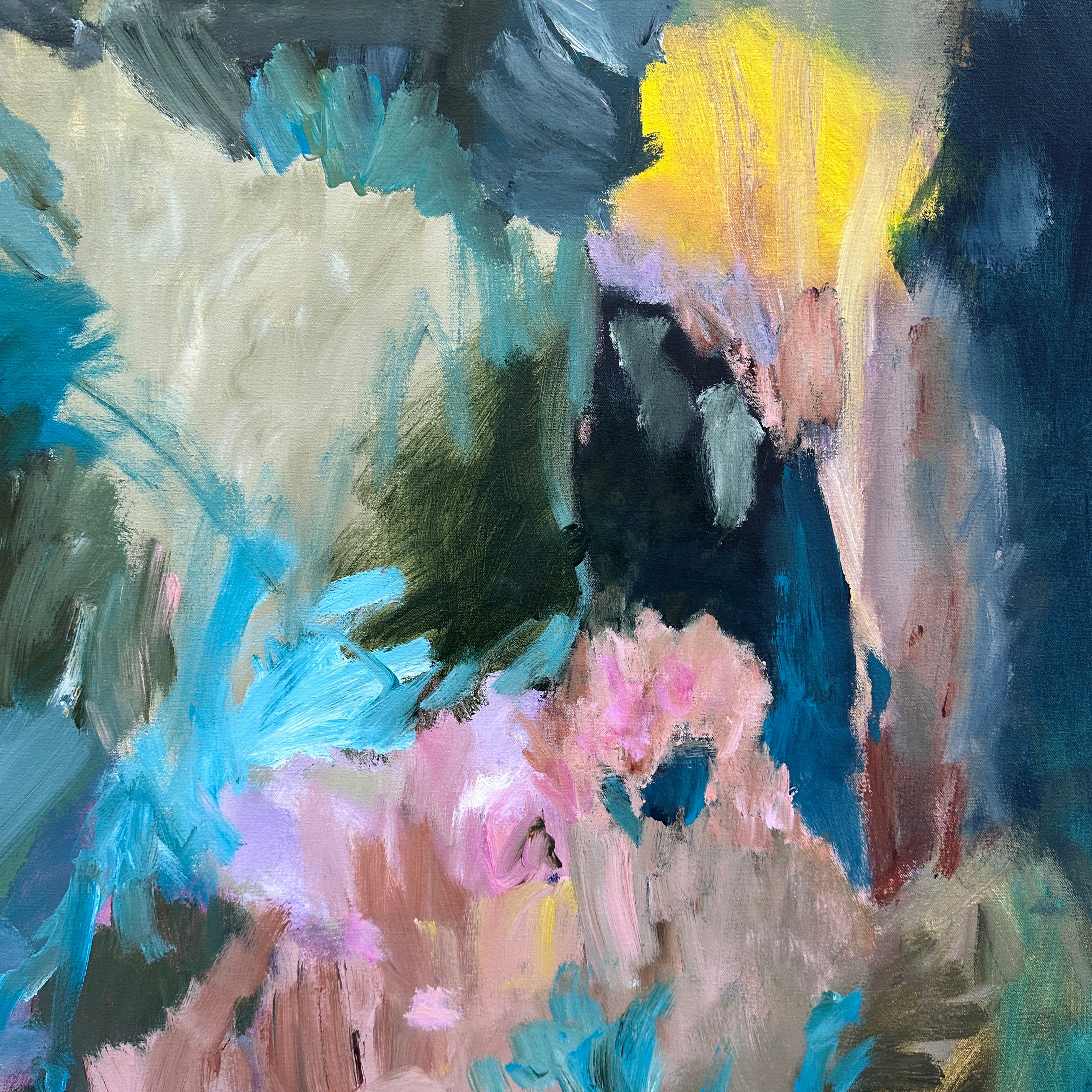 Close- up detail of brushwork of abstract painting with a mix of colours including blue, pink, and yellow.