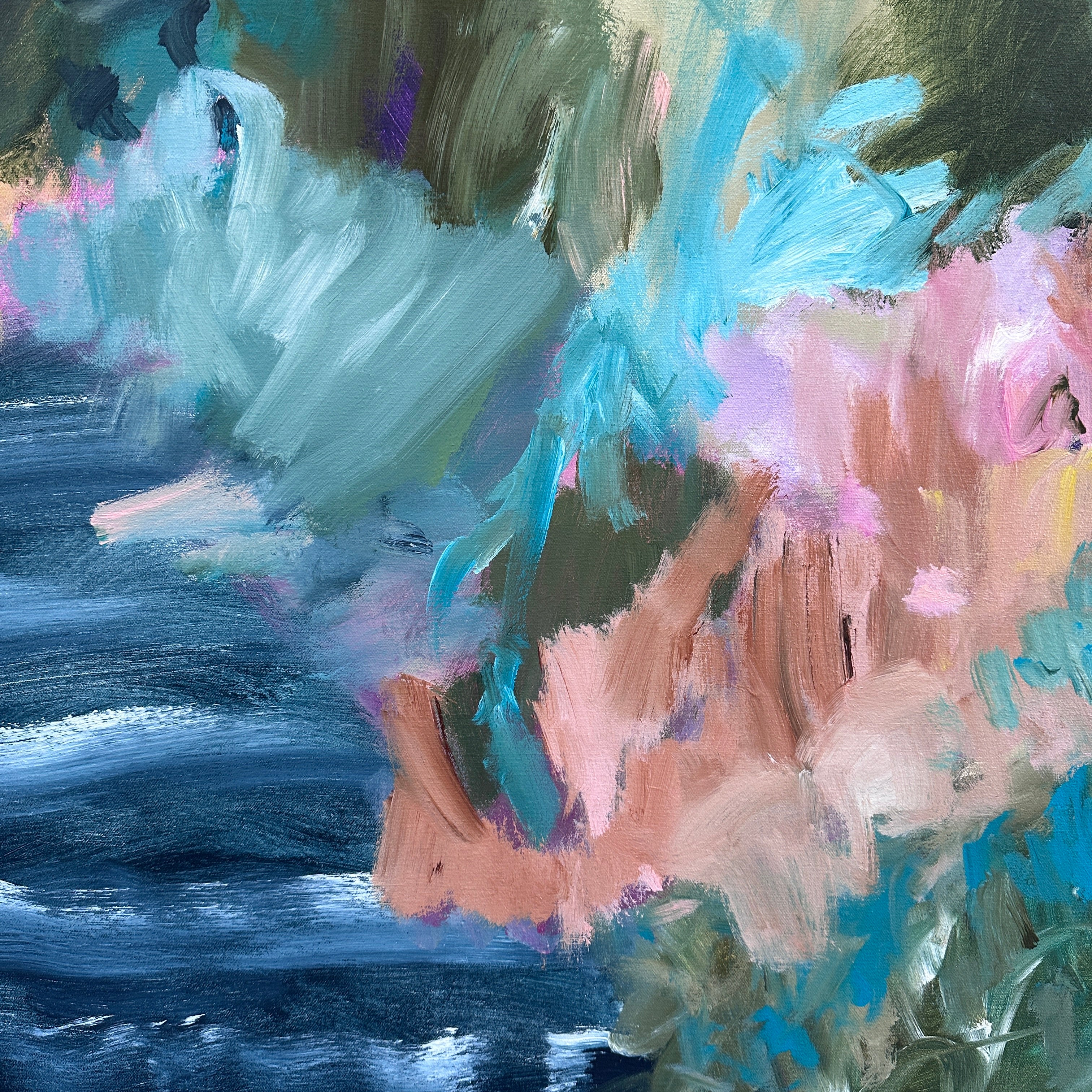 Close-up of abstract painting with a mix of blue, pink, and green colours.