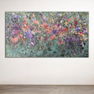 Abstract expressionist painting hanging on wall in contemporary space