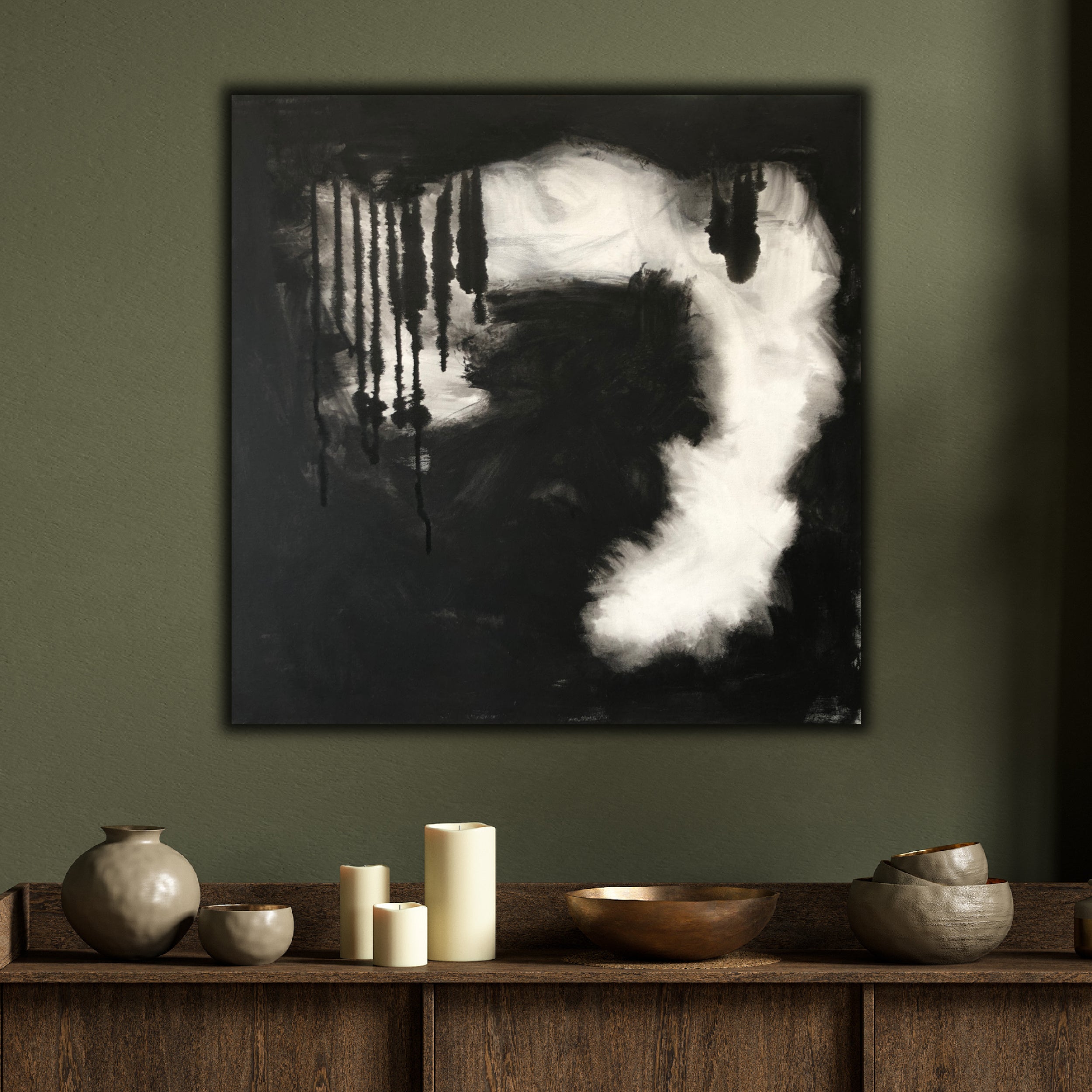 Square, black and white abstract painting hanging on wall of moody home interior - modern home interior view