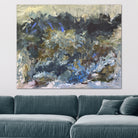 Large abstract expressionist painting hanging on wall in modern living room