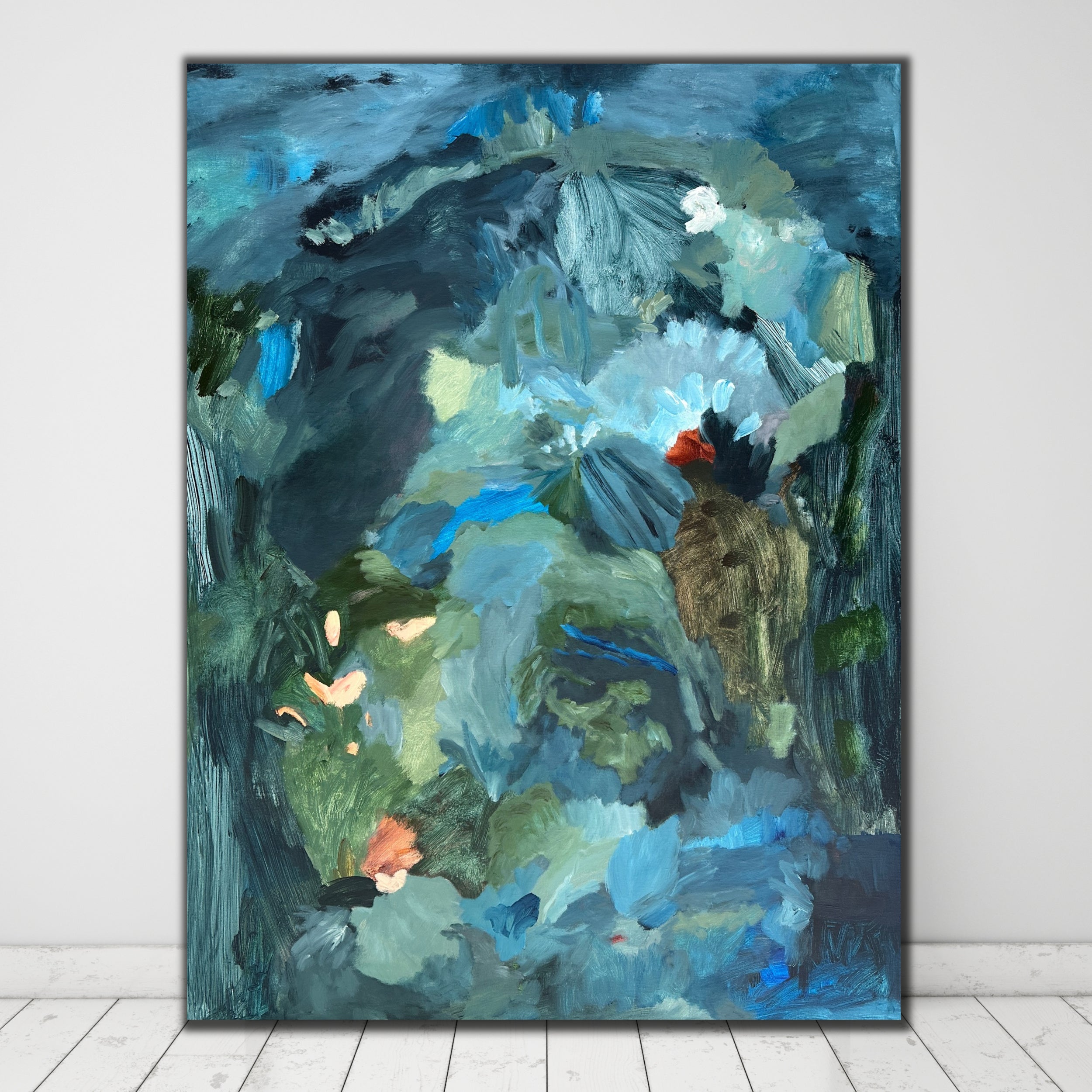 Blue and green abstract landscape painting by Kylie Sams in white interior space