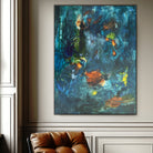 Abstract expressionist painting in dark blue, brown, green and hints of yellow hanging in neutral interior space. 