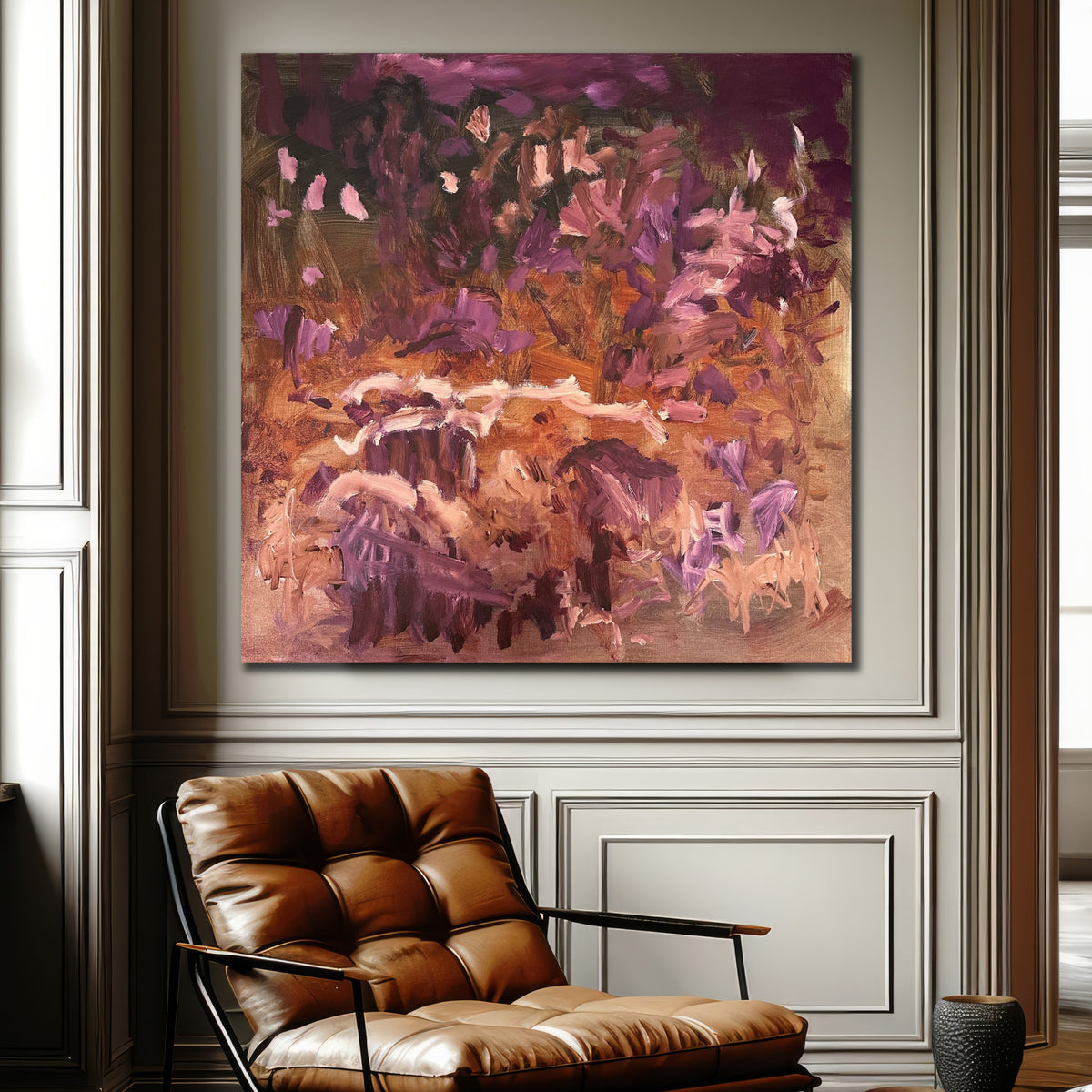 A large square abstract painting on canvas in shades of burgundy, maroon, brown and blush pink hanging on wall in neutral living room. 